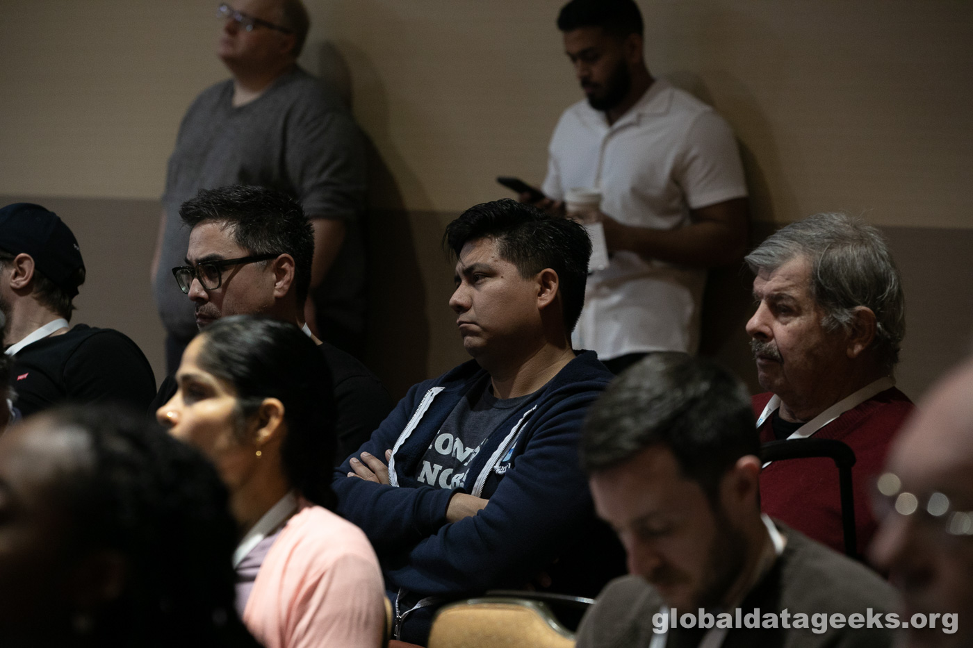 Joe MF Reis, Juan Sequeda, and Bill Inmon seated in the audience at Data Day Texas 2023